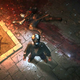 A Tarnished from Elden Ring is standing next to a body pooled in blood, probably wondering what happened.